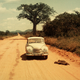 Image for article titled This Guy Raced A Tiny Two-Stroke DKW Surrounded By Lions In Africa